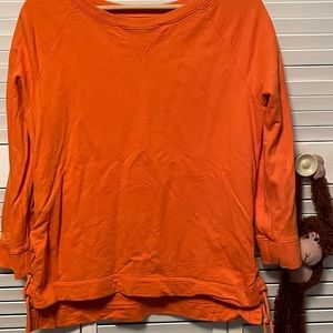 Solid orange side lace up sweatshirt. 3/4 sleeves. Size L